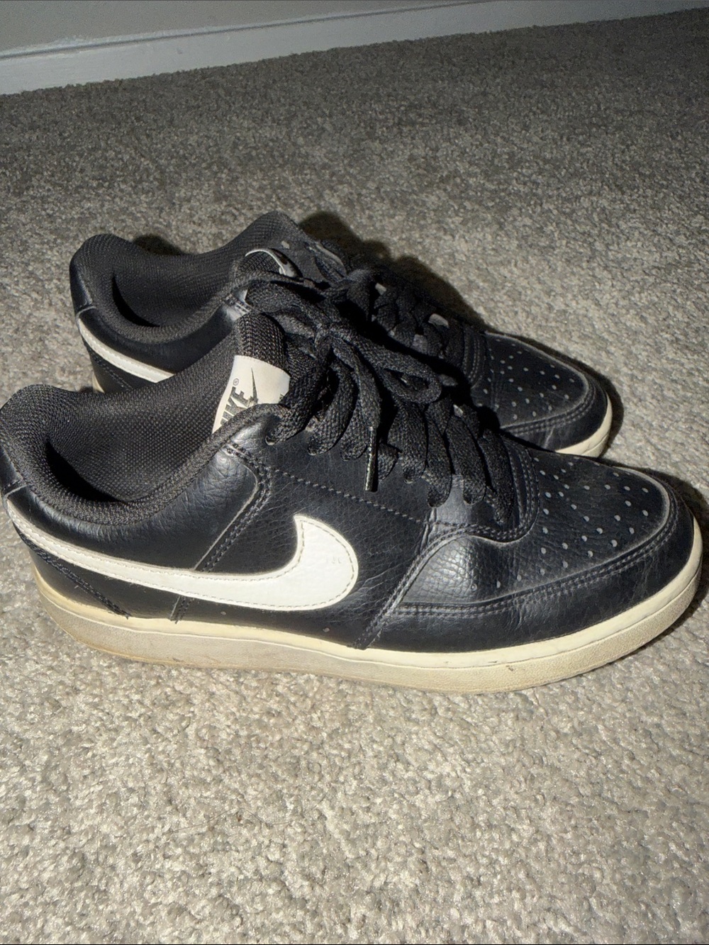 Nike Black Sneakers with White Swoosh